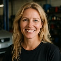 image of blonde woman in a garage close up smiling